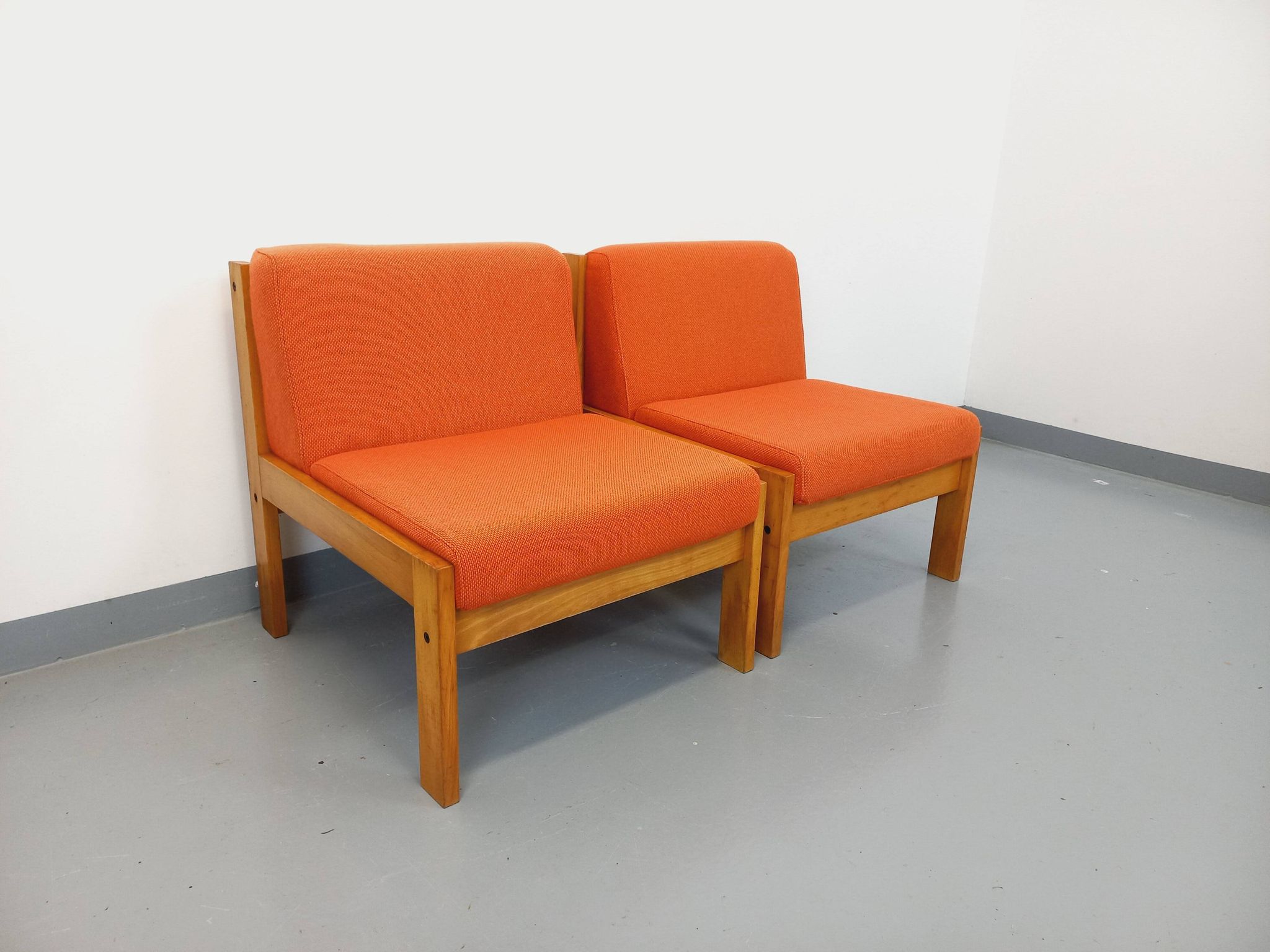 Set of 2 vintage Baumann armchairs in orange fabric and wood from the 80s