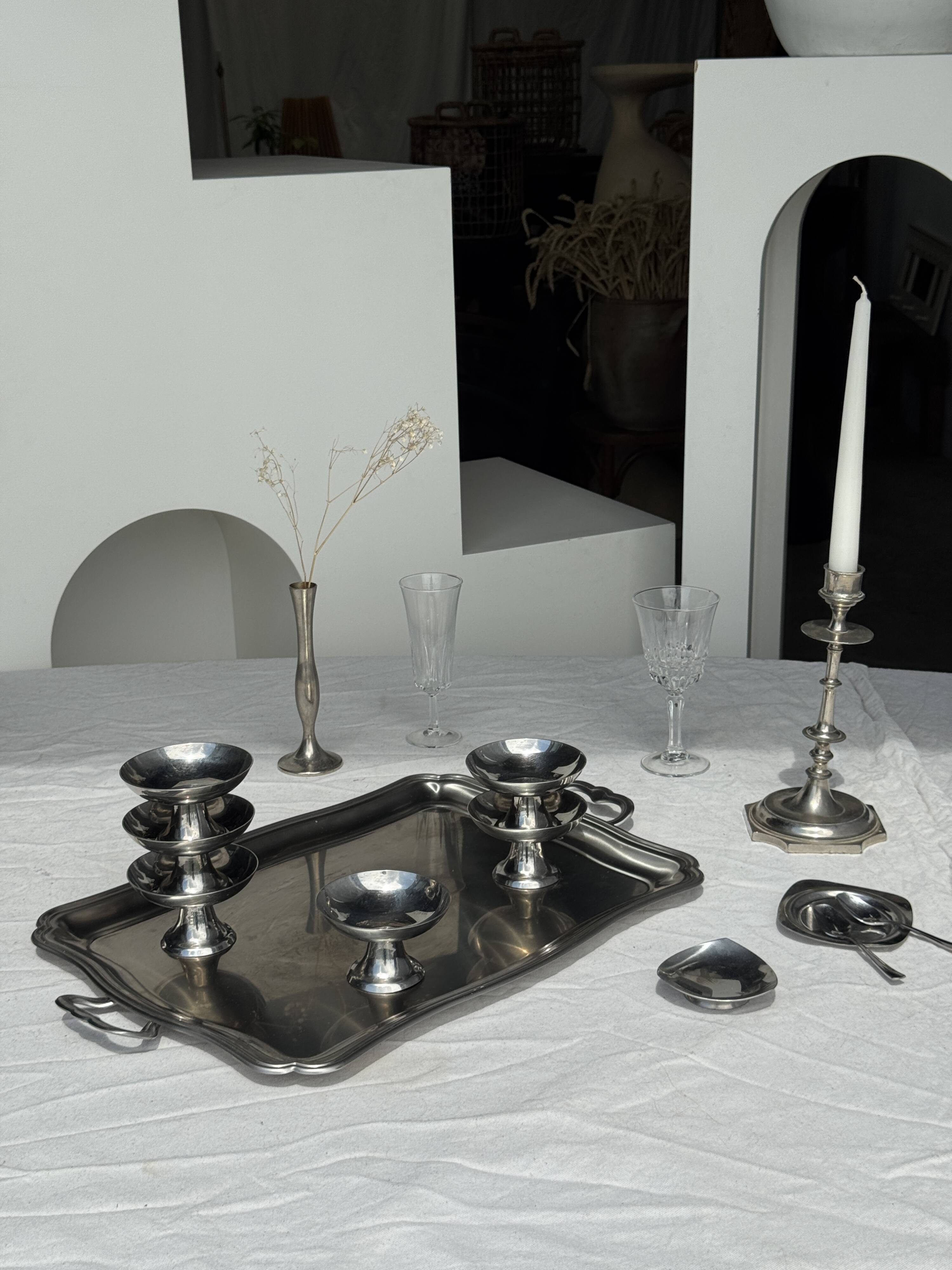 Guy Degrenne silver stainless steel serving tray with an eventful shape