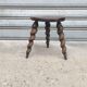 Turned wooden tripod stool