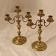 Pair of chiselled brass candelabra. Swedish craftsmanship, 20th century.