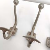 Three metal hooks