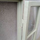 Old window mounted as a fenestron