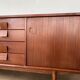 Scandinavian teak sideboard, 230 cm long, with 3 doors and 4 drawers.