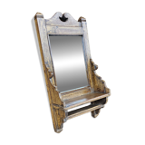 Antique barber's mirror in Burmese teak.