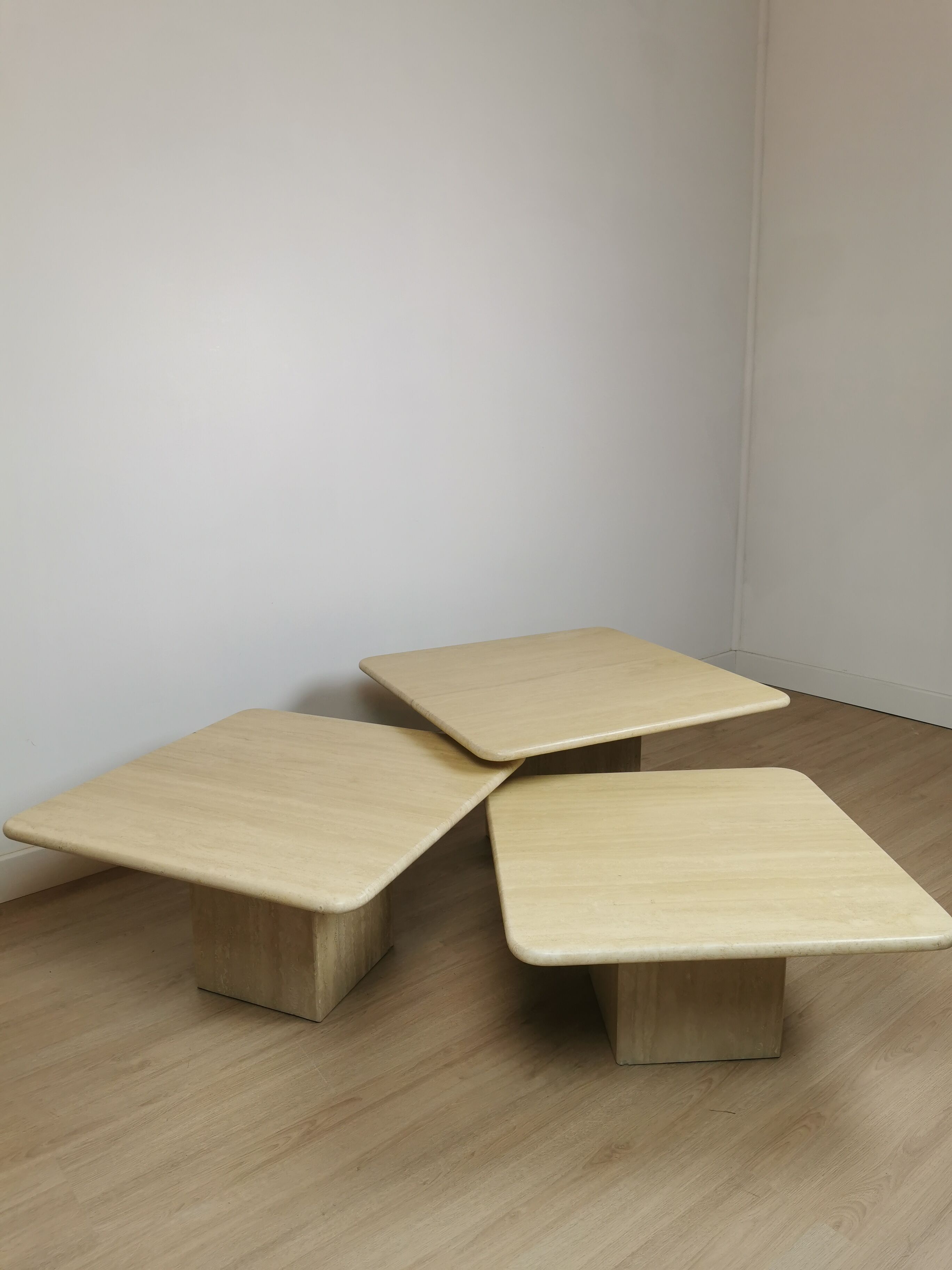 Side tables in travertine 70s