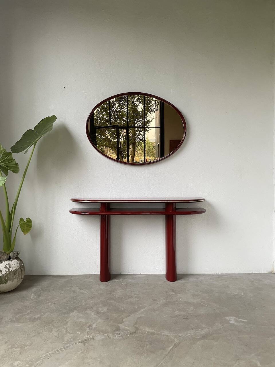 Red lacquered console and its mirror from the 80s