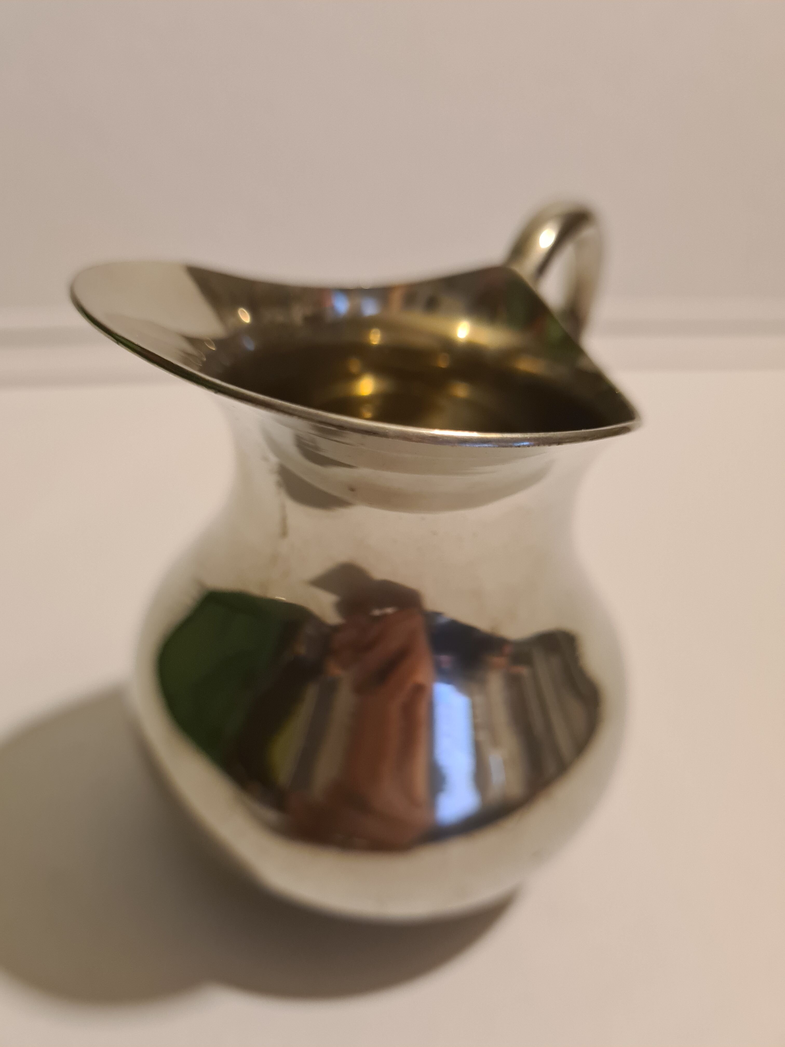 Guaranteed fine pewter milk jug (France)