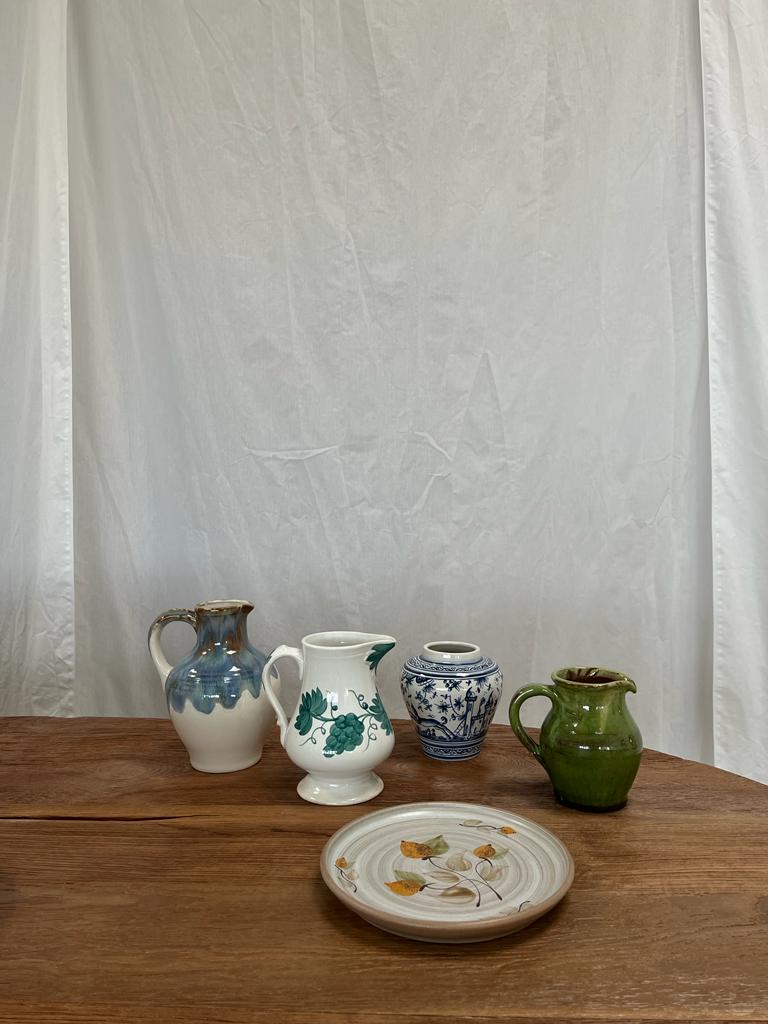 Green glazed ceramic pitcher