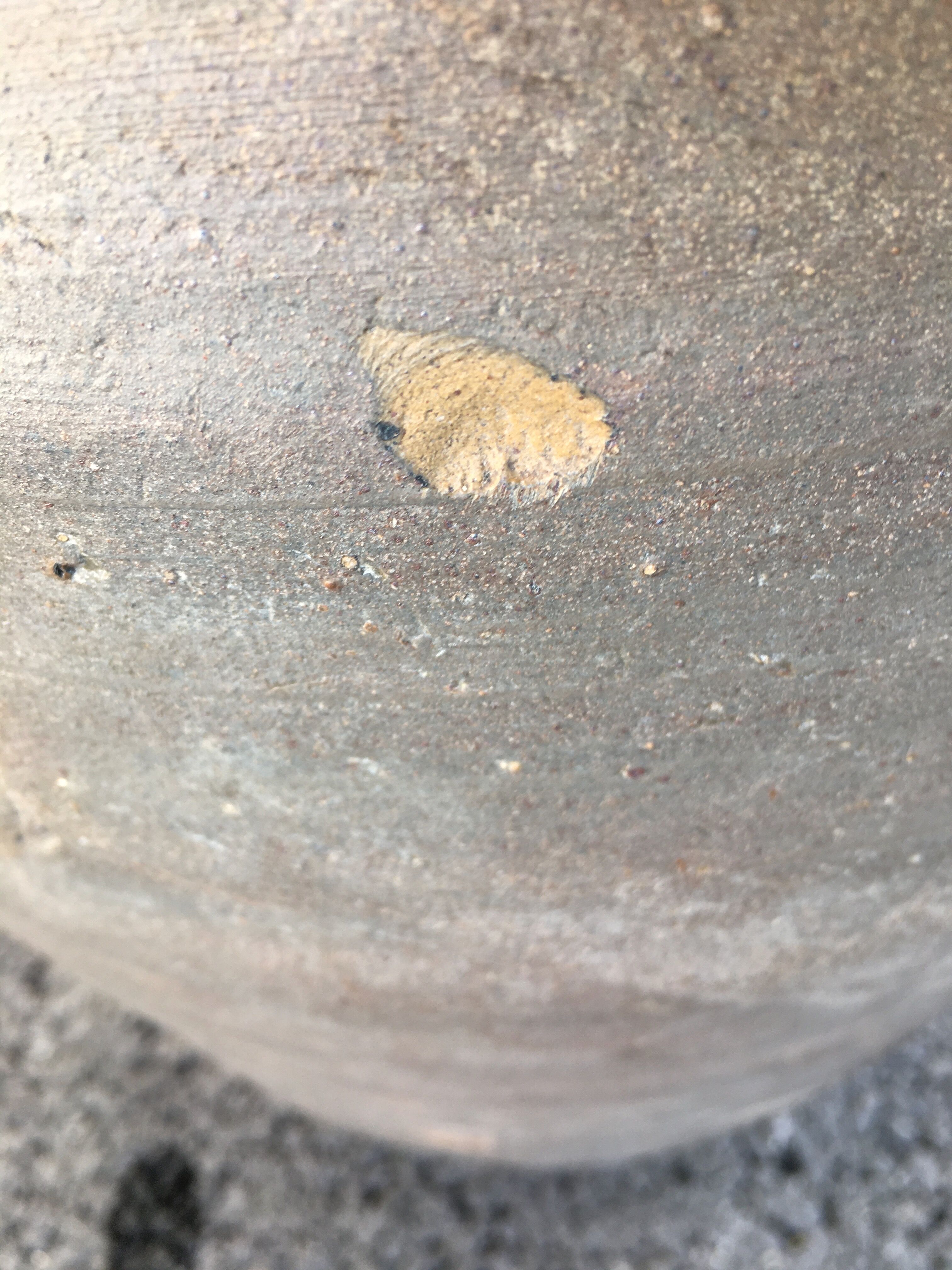 Old jug with two sandstone handles