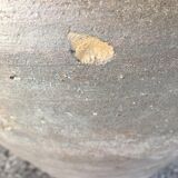 Old jug with two sandstone handles