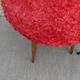 Pair of tripod stools, with tapered wooden feet and moumoute seat