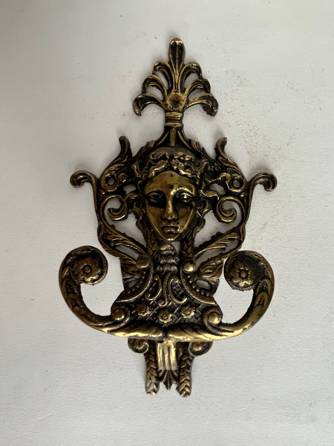 Antique hook in gilded bronze