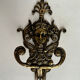 Antique hook in gilded bronze