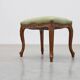 Louis XV stool with carved floral apron and original damask upholstery