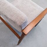 Mid Century Easy Chair in warm grey textil.