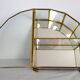 Pair of gilded brass, glass, mirror display cases from the 60s