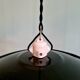 Three industrial suspensions in black enamelled sheet metal.