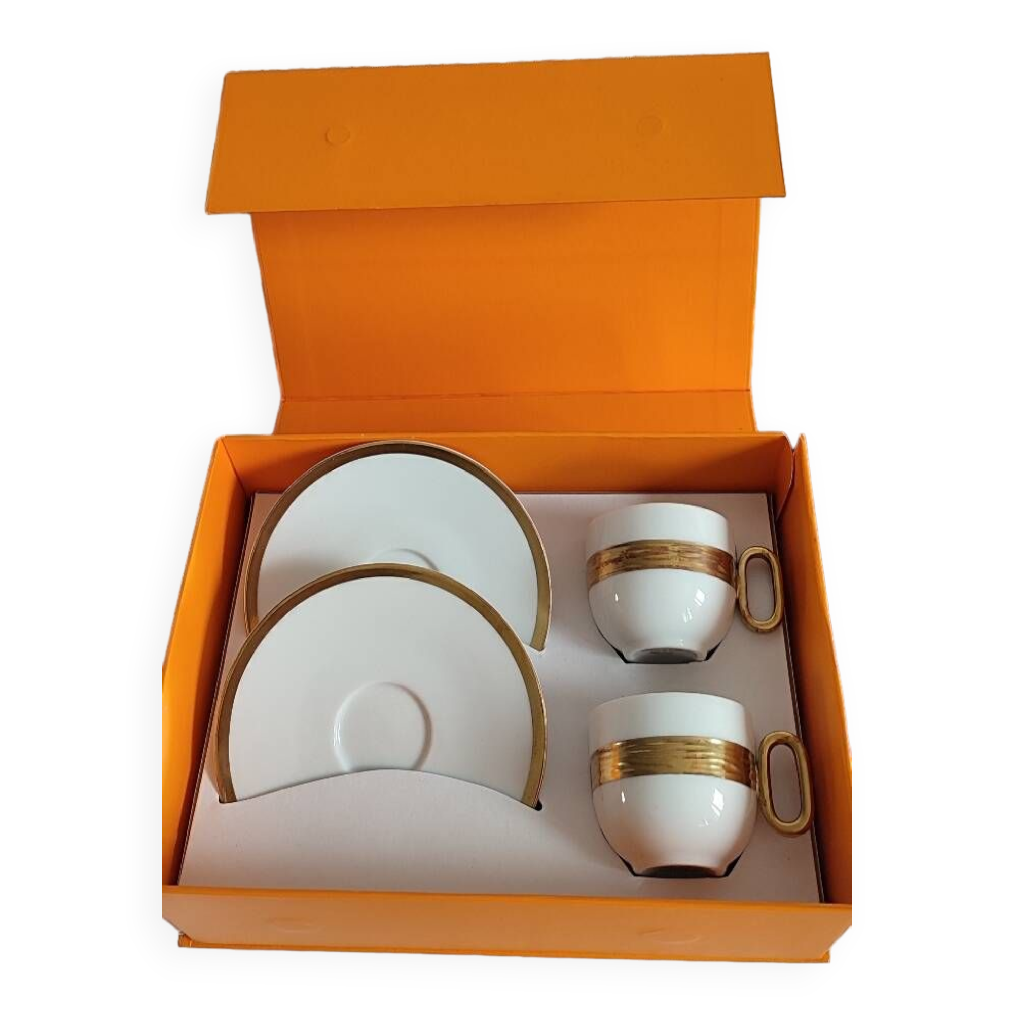 Médard de noblat cups and saucers.