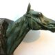 Art-Deco bookend Horse in patinated regulation on black marble support