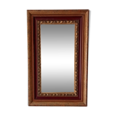 Antique mirror in carved solid wood