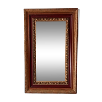Antique mirror in carved solid wood