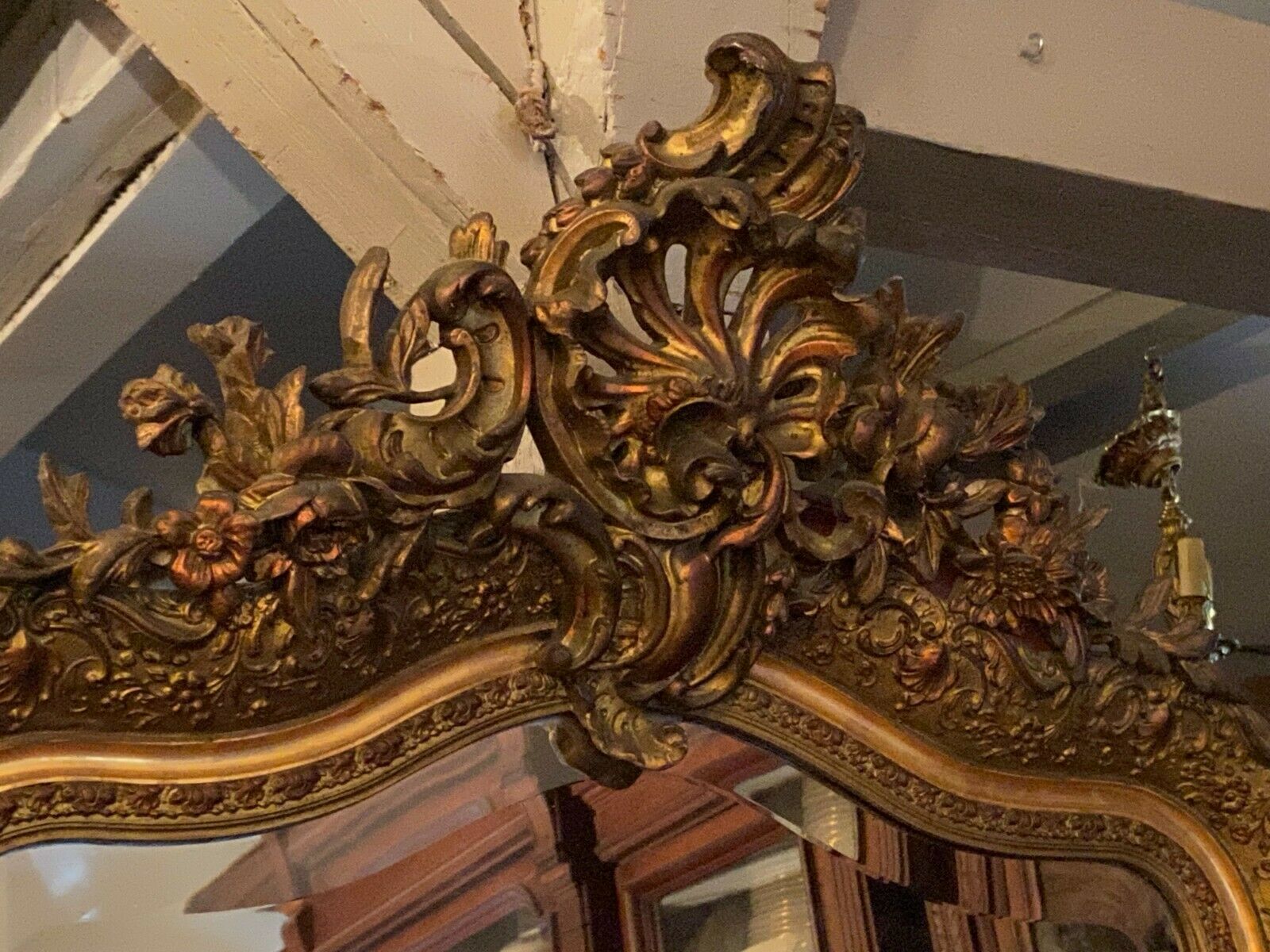 Golden mirror with bevelled ice pediment in Regency style