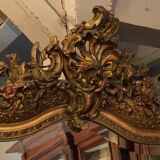 Golden mirror with bevelled ice pediment in Regency style