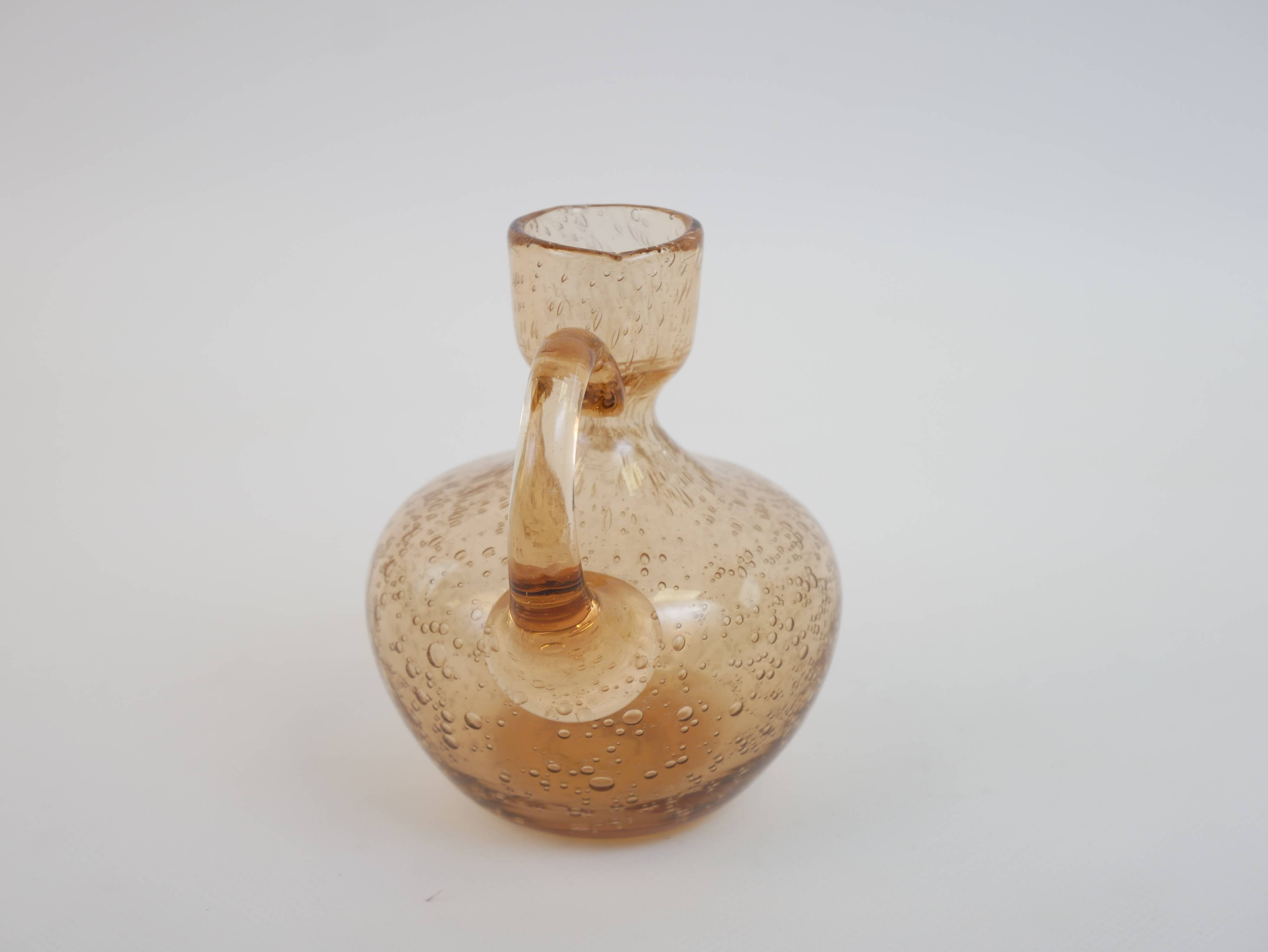 Petit porte bougie en verre bullé rose de Biot