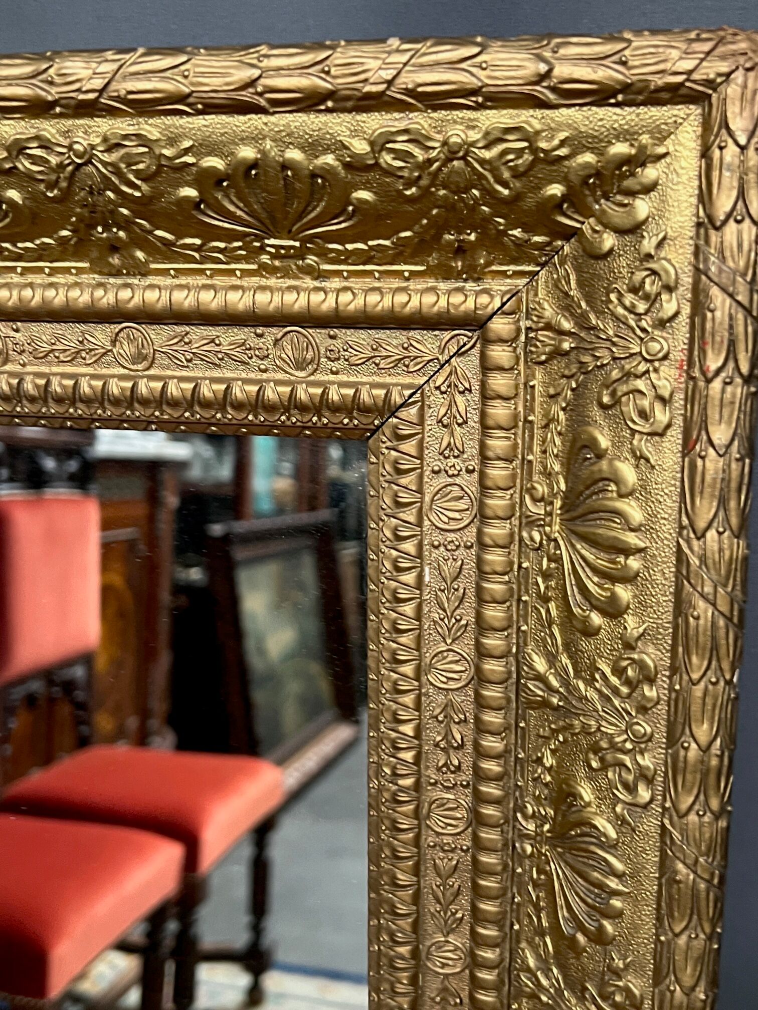 Antique mirror in a baguette frame