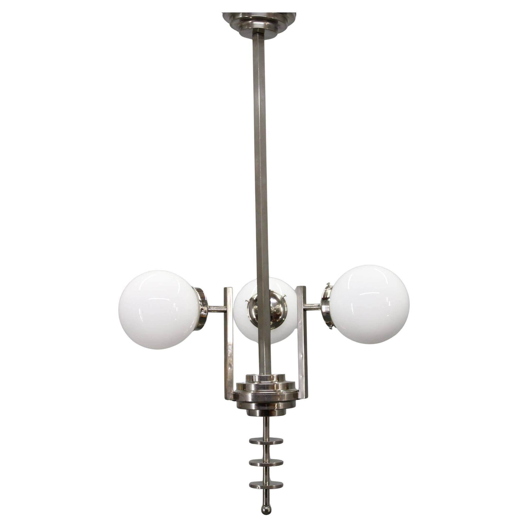 Czechoslovak Art Deco nickel chandelier with three opaline glass globes