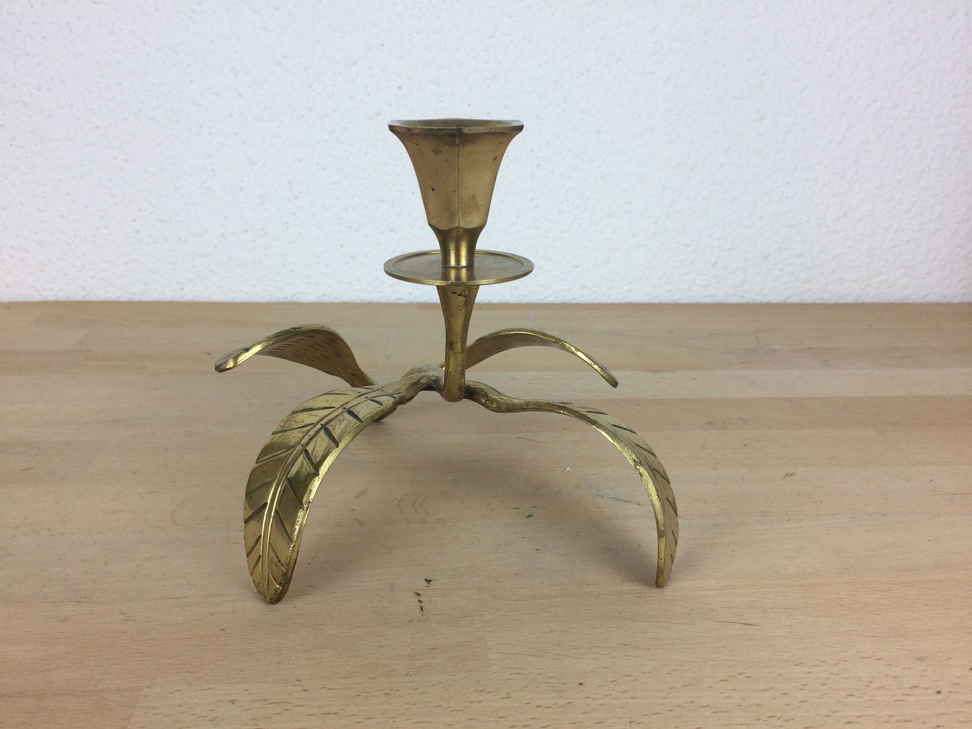 Candle holder flower leaves in golden brass