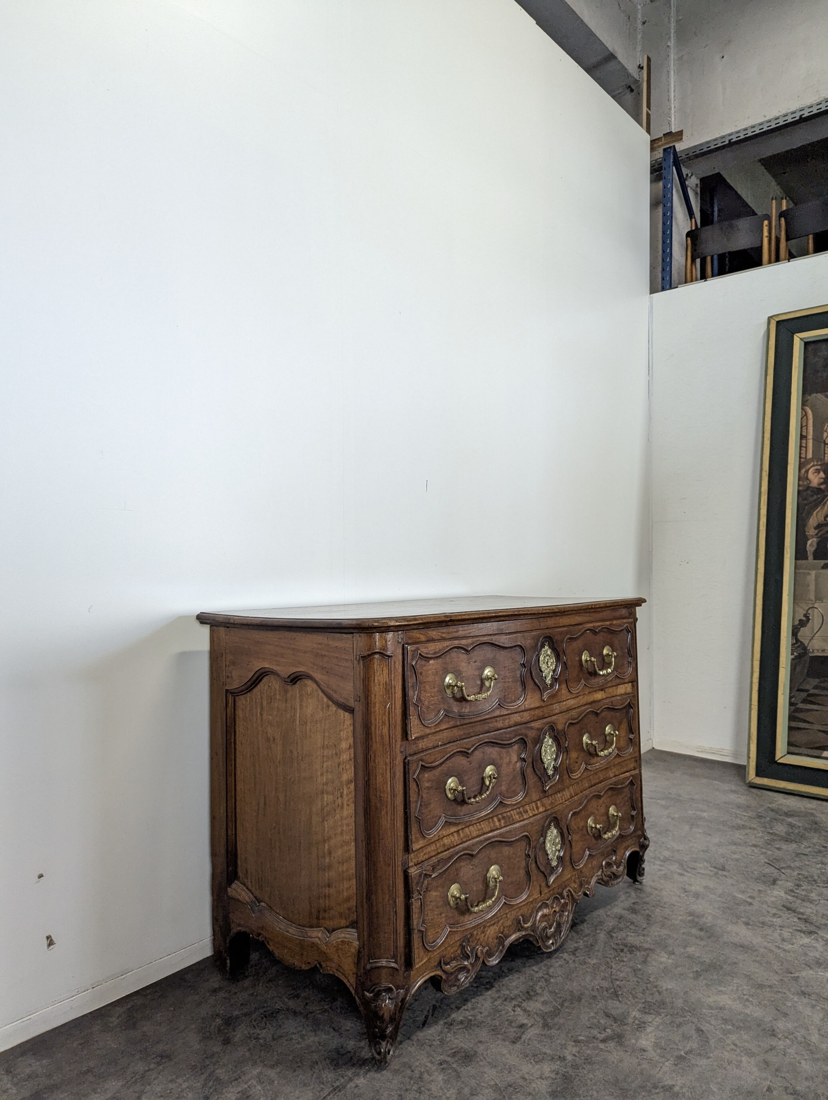 18th century Lyonnaise chest of drawers in carved walnut and bronze