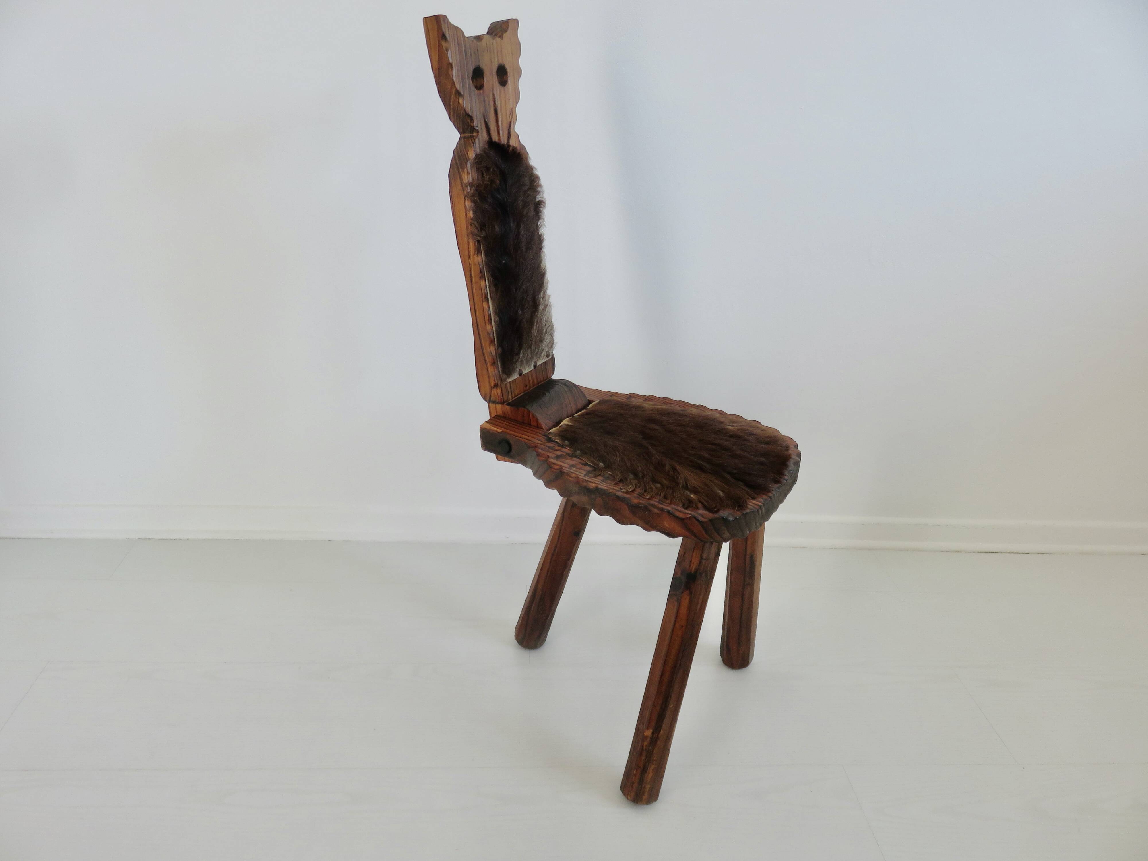 Brutalist cowhide tripod stool in solid wood