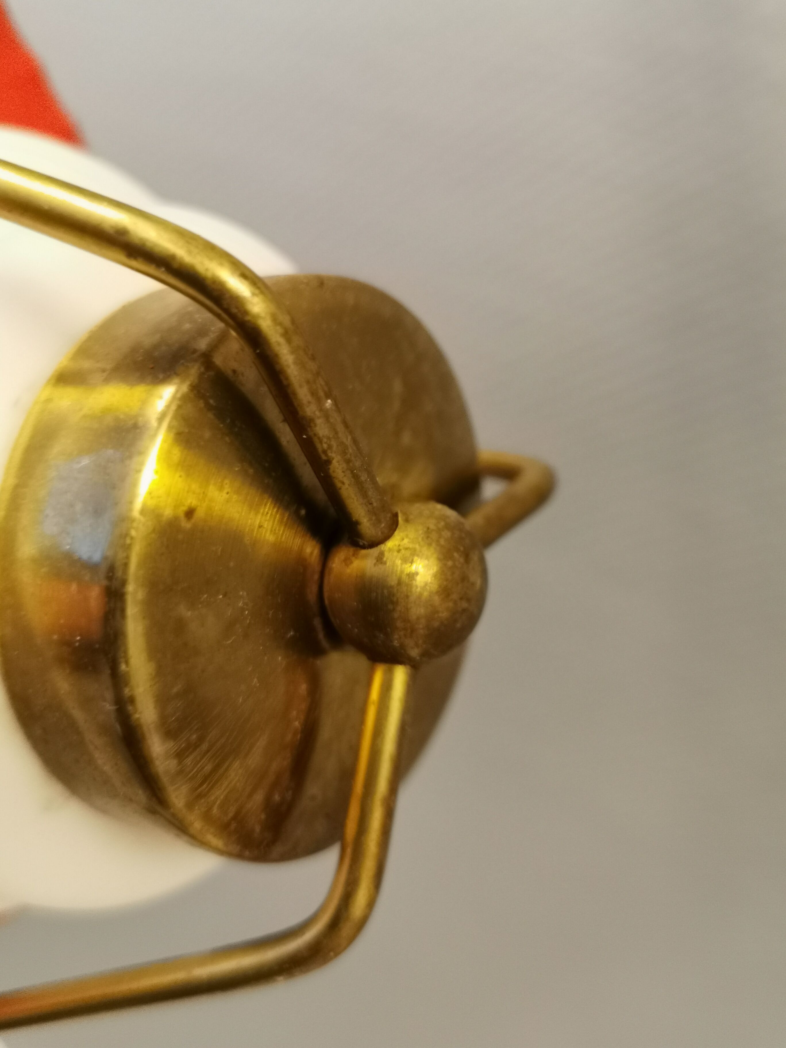 Danish hanging lamp from the 50-60s, made of brass, metal and with milky white glass shade.