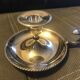 Pair of silver metal hand candle holders