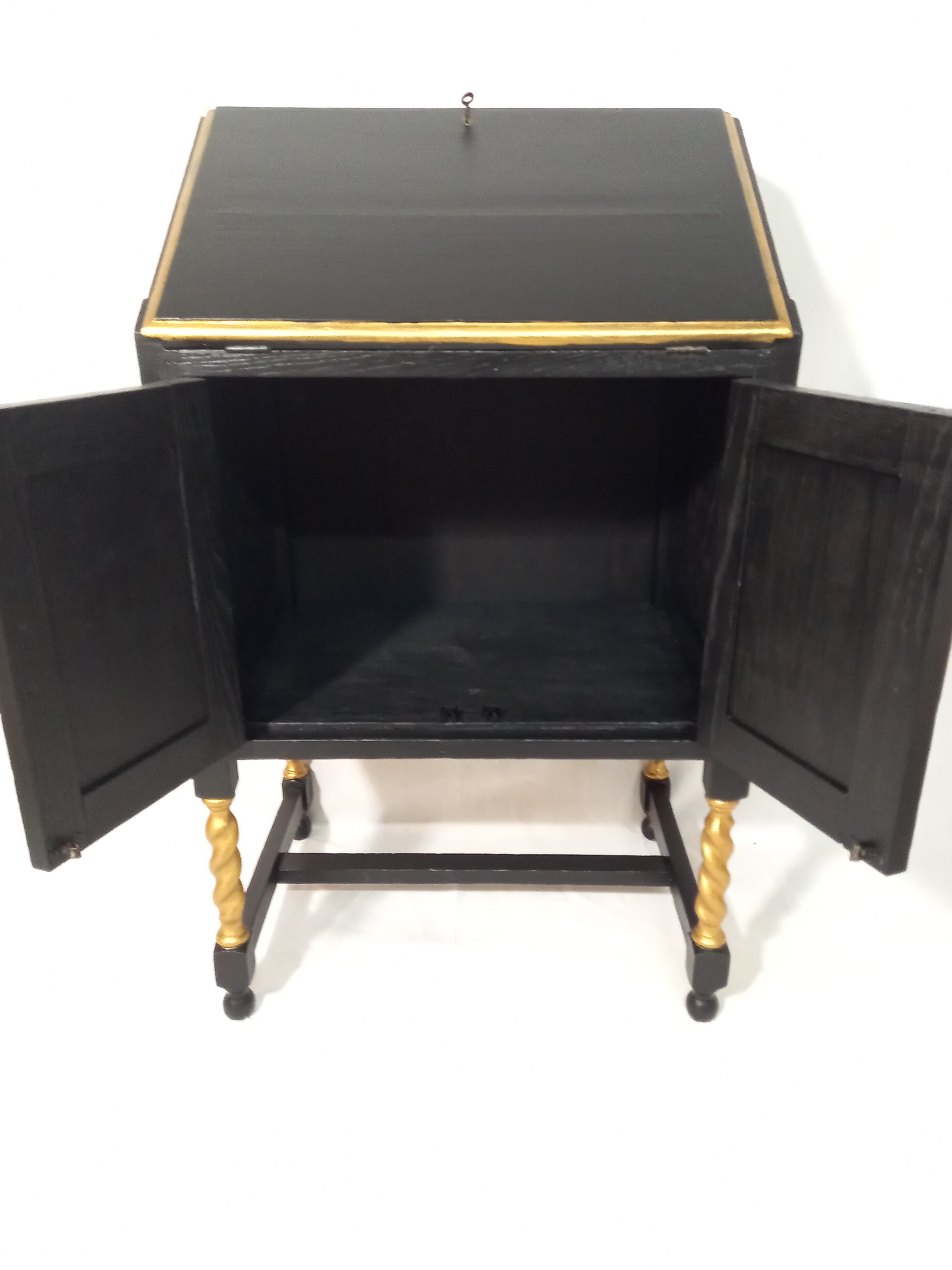 Small secretary with black and gold lid