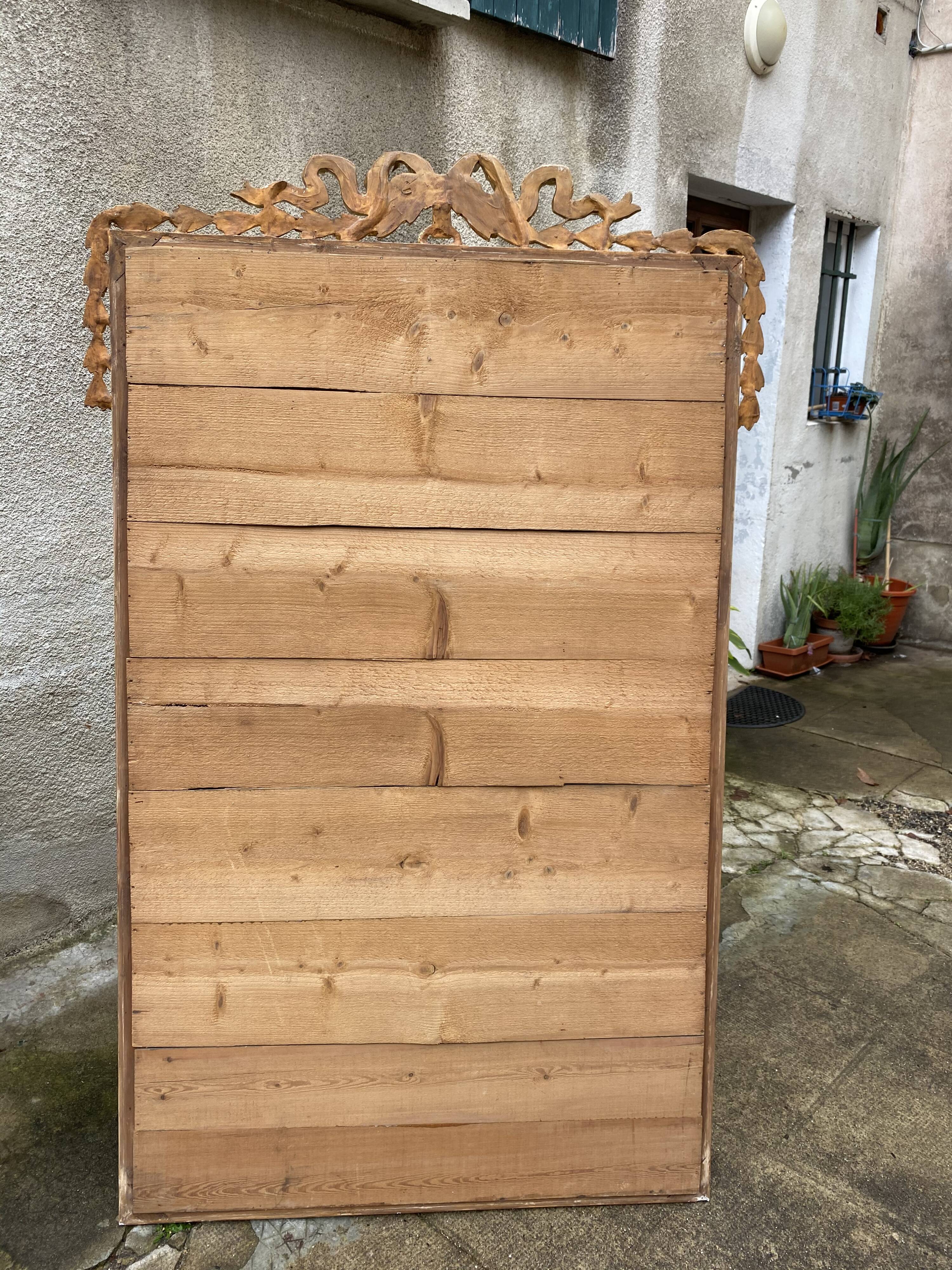 Louis XVI style mirror in gilded wood 176x109cm
