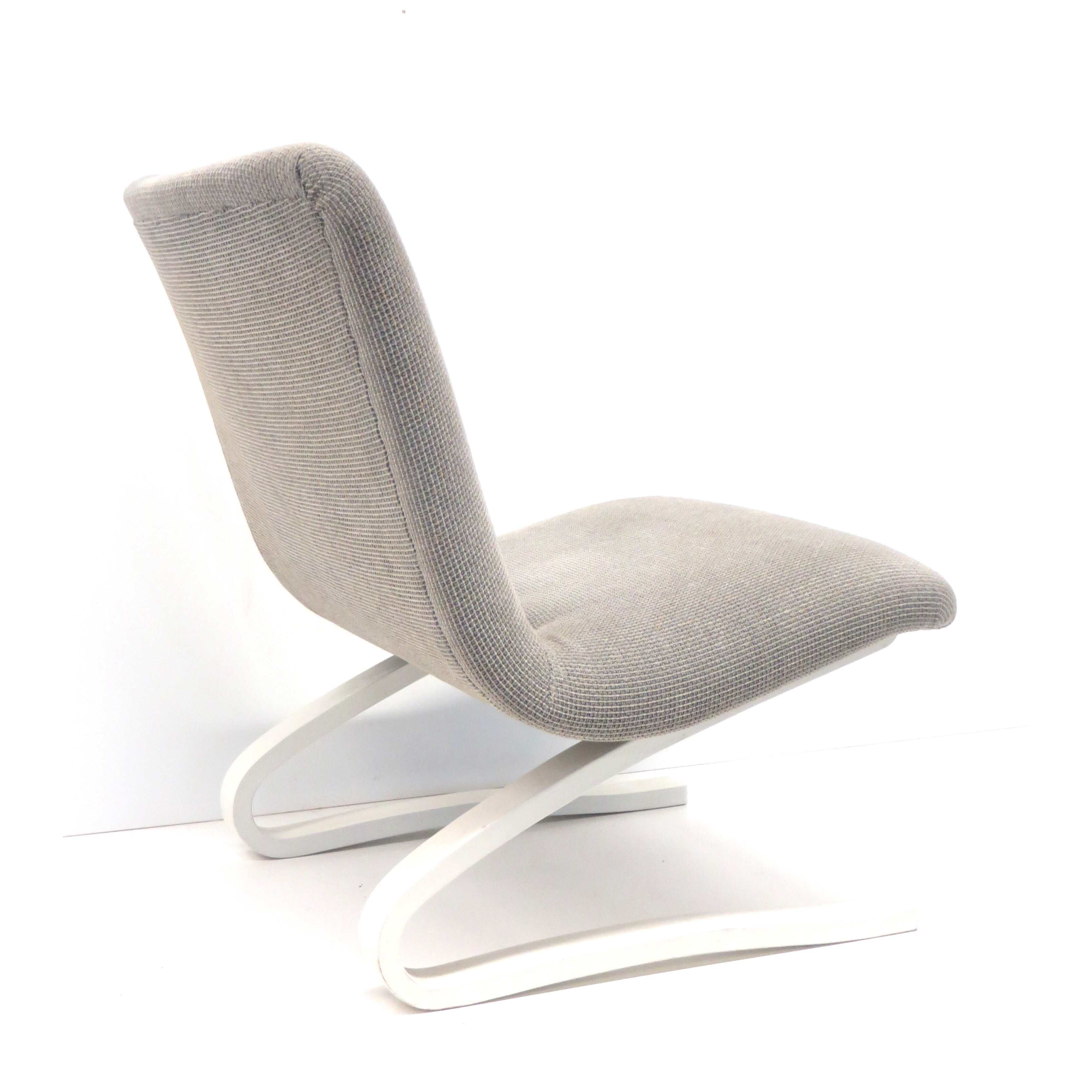 Vintage armchair with white bouncy wooden base made in the 70s