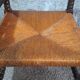 Fireplace corner chair in Louis XIII style, turned wood with braided rush, 19th century.
