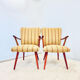 A pair vintage cocktail chairs with stripes and metal screws