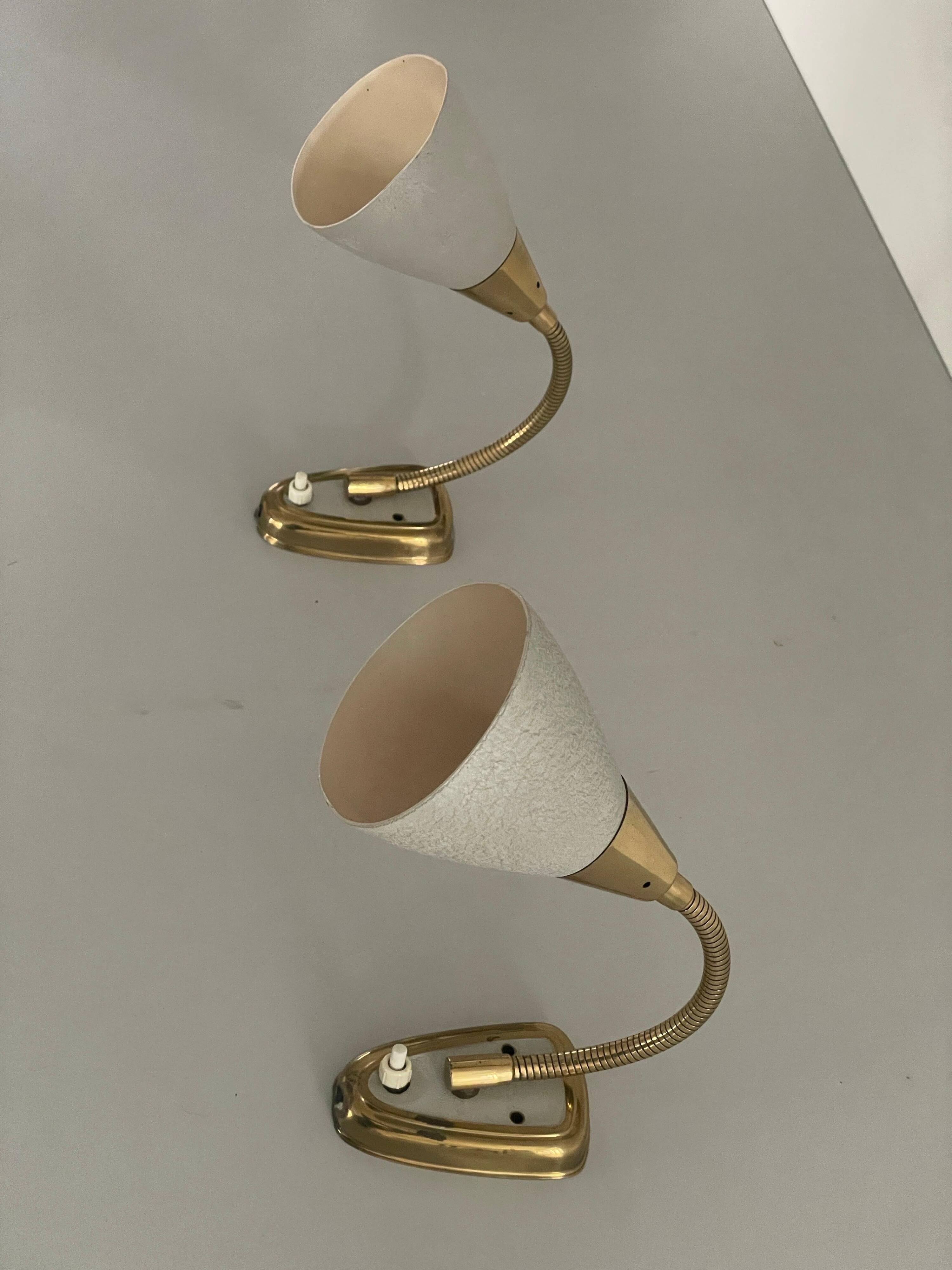 Pair of grey metal and brass wall lights, 1960s, Germany