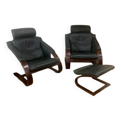 Paire de fauteuils scandinave avec un repose pied de la marque NELO