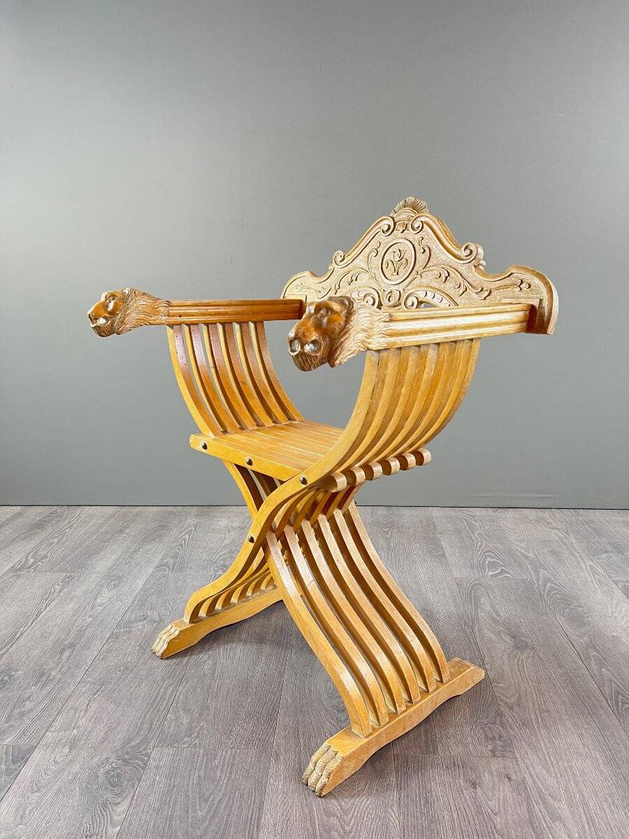 Pair of Renaissance-style folding armchairs, early 20th century