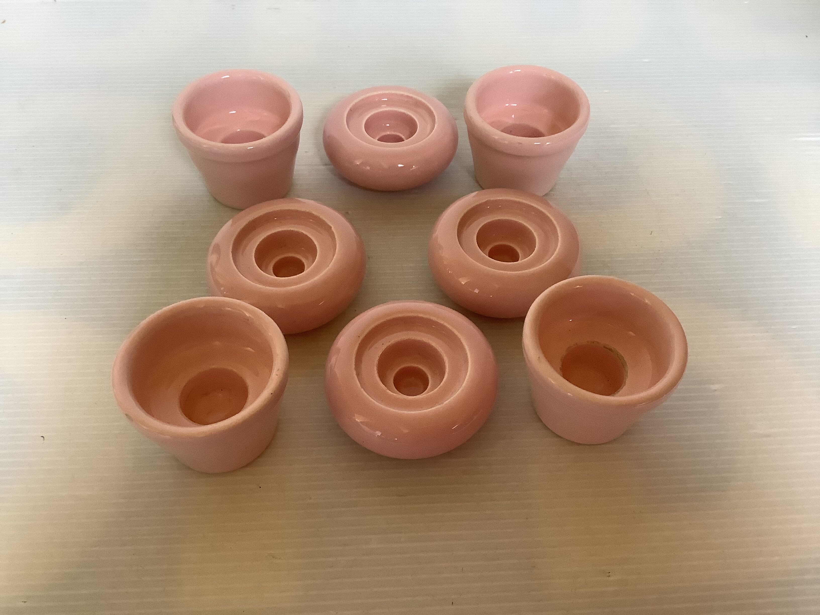 Four double pink candlesticks