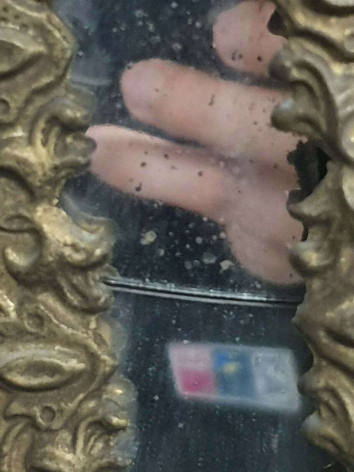 Old bevel mirror with metal parcloses pushed back Louis XIV style