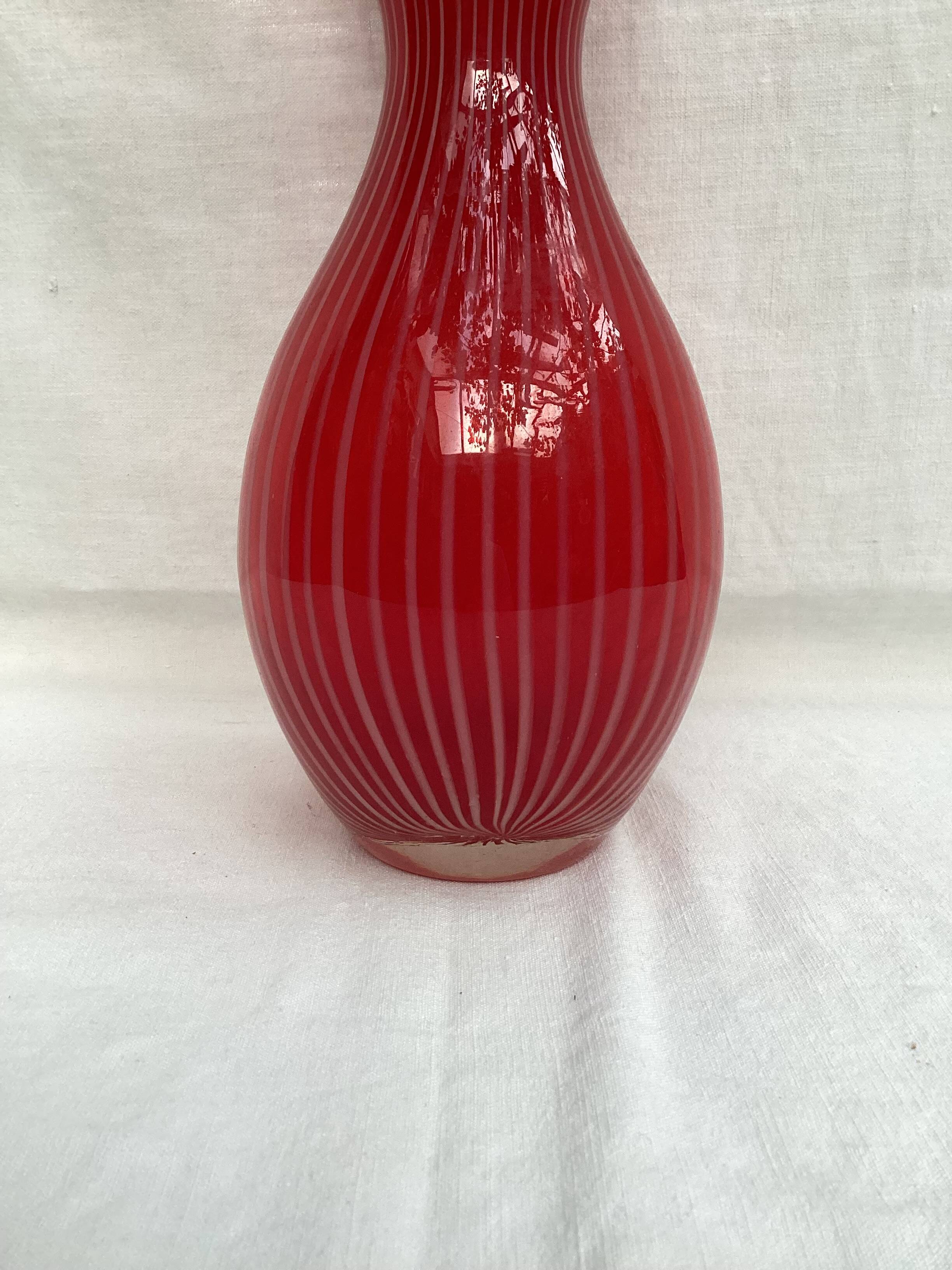 Red glass vase dimension: height -33cm- width -12cm-