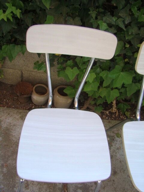 Pair of veined fomica chairs 60