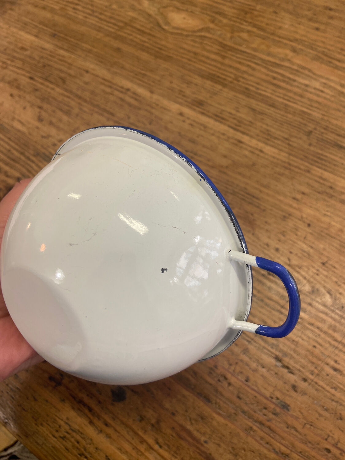White enamel bowl and blue border