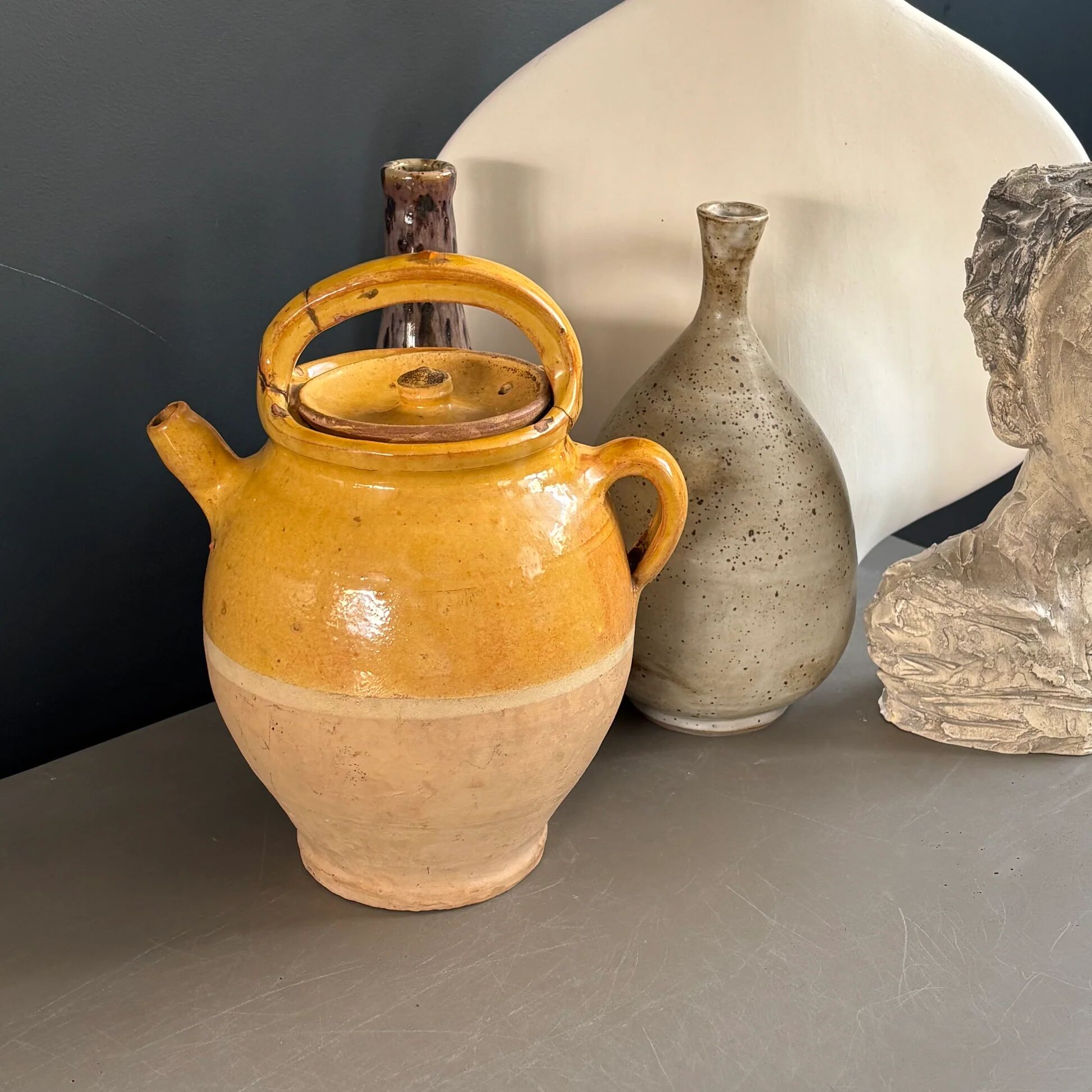 Ancient oil jar in glazed terracotta