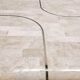 Coffee table in mosaic travertine and brass 70
